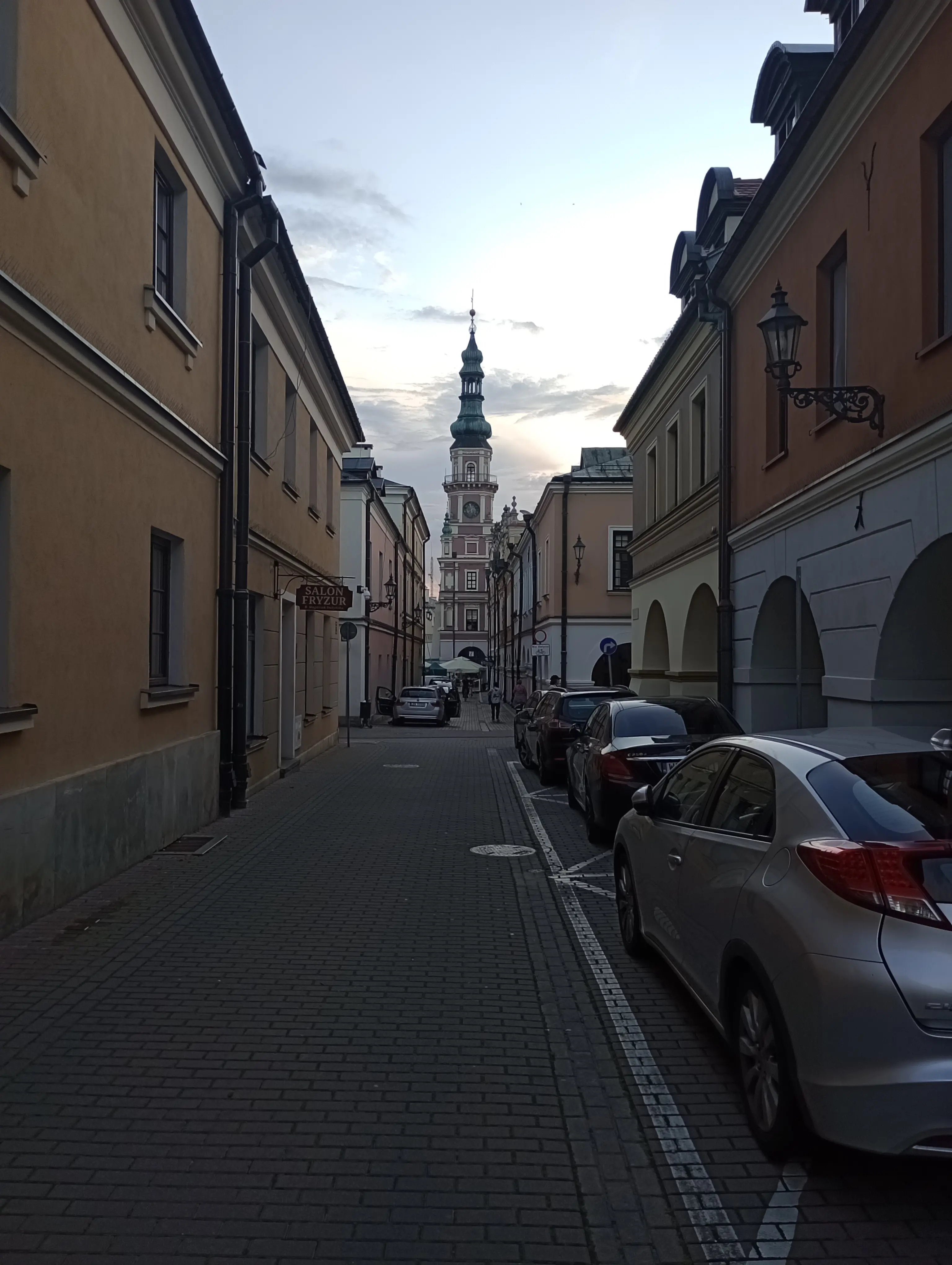 view from Armenian Street in the old town of Zamość, the tower of Town Hall at the end