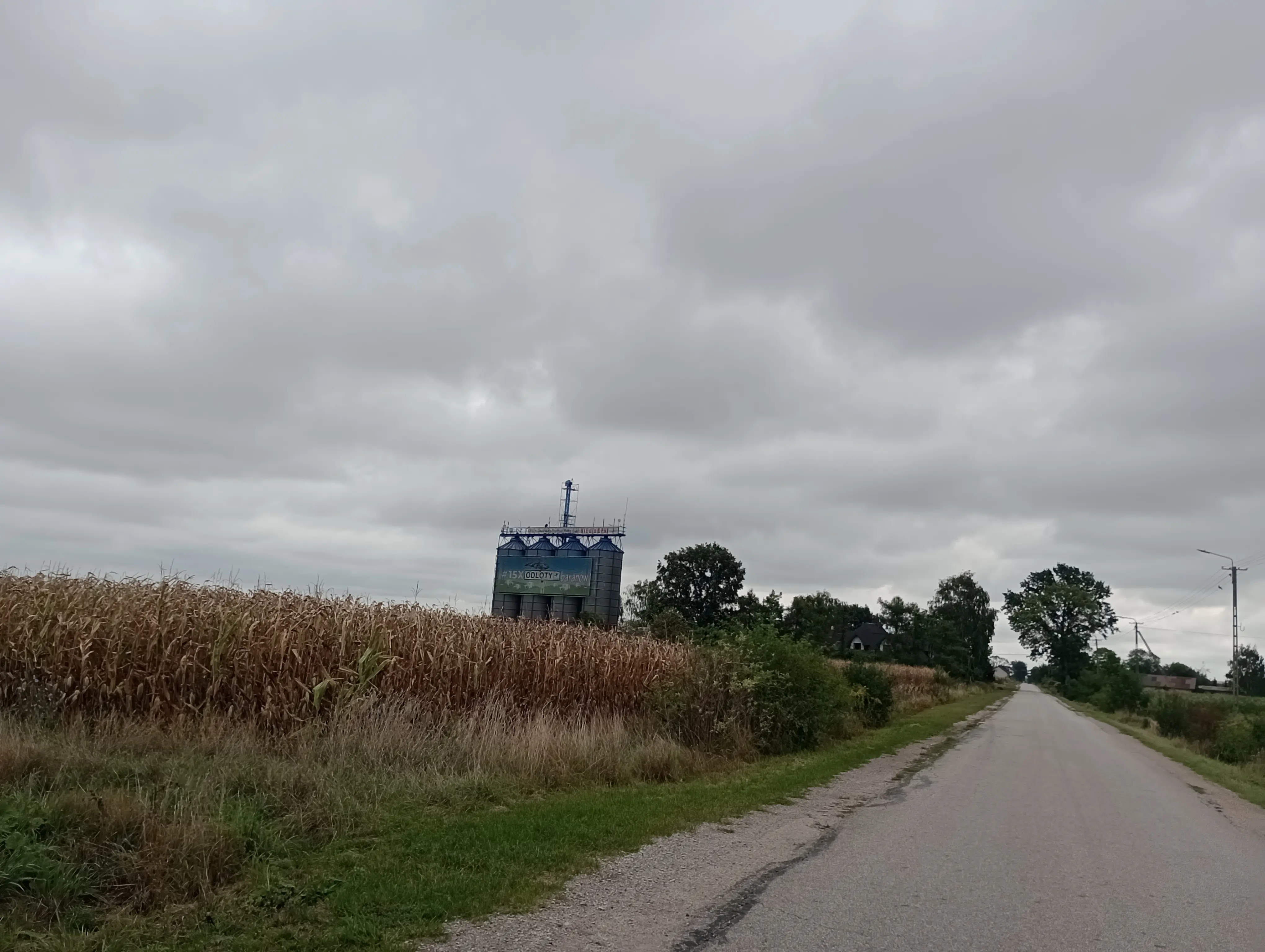 giant protest sign against new airport on farm silos